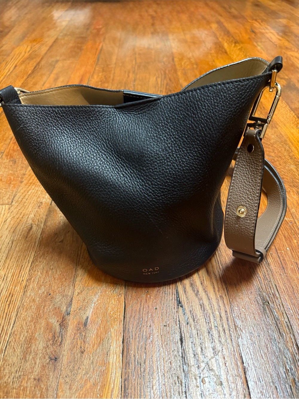 OAD New York Black Pebbled Leather Bucket Shoulder Bag with Taupe Strap